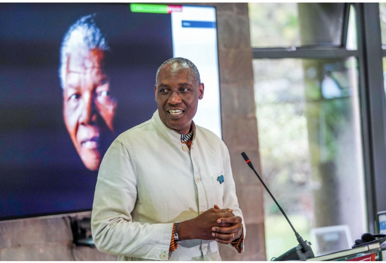 Kaddu with Madiba photo in a presentation