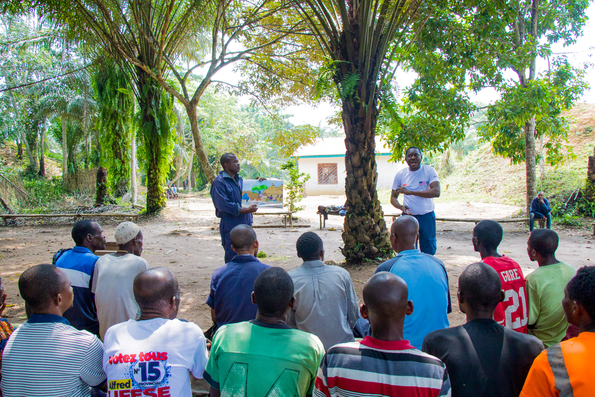 Jean Ayolo Yokolo and AWF Senior Social Safeguards Officer, Dodo Moke at one of their presentations to the scouts
