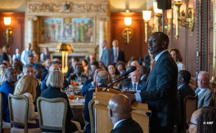 H.E. William Ruto speaks at a podium during an event in Washington, DC.