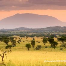 Dawn breaks behind a mountain in Kidepo Valley National Park.