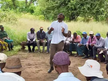 Community meeting in Mbire